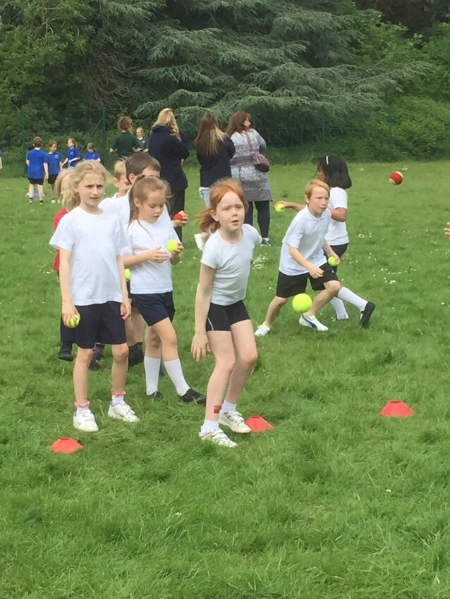 Image of Year 3 play at the Kwik Cricket competition